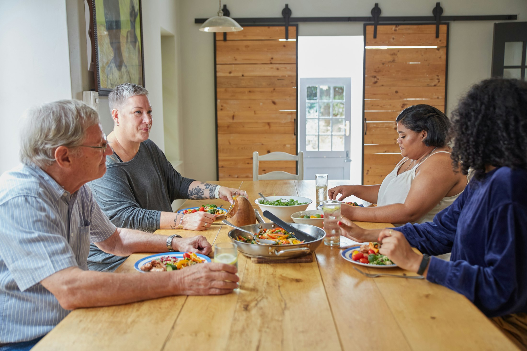 High-resolution students sharing healthy meals in a cafeteria setting