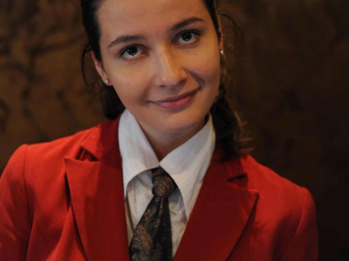 Hotel receptionist portrait representing service assurance persona